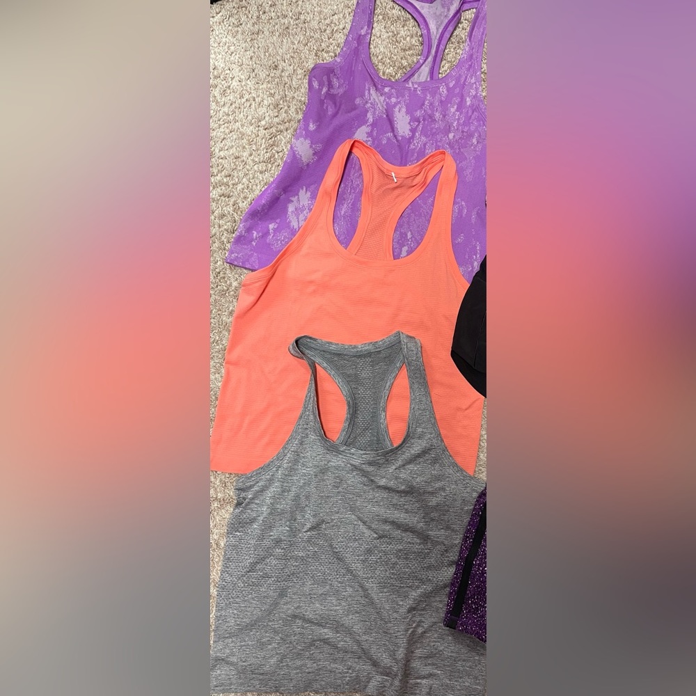 Lululemon size 8  swiftly racerback 2.0 tanks race length( lot of 3)